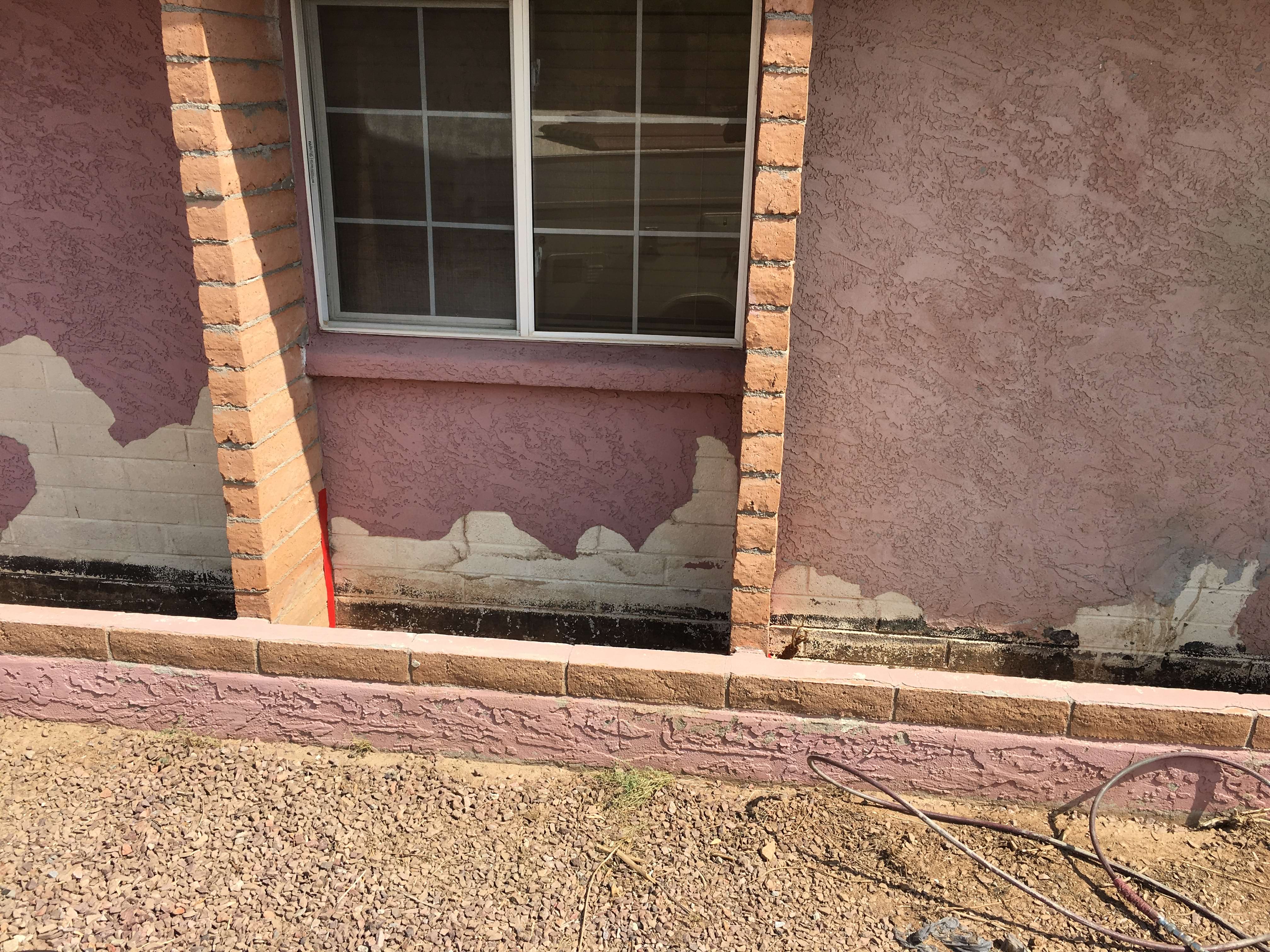 Stucco Falling off Painted Block (delamination)